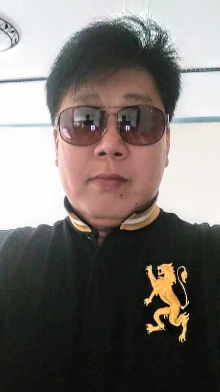 含笑半步癲的第一张照片--宁化婚介网
